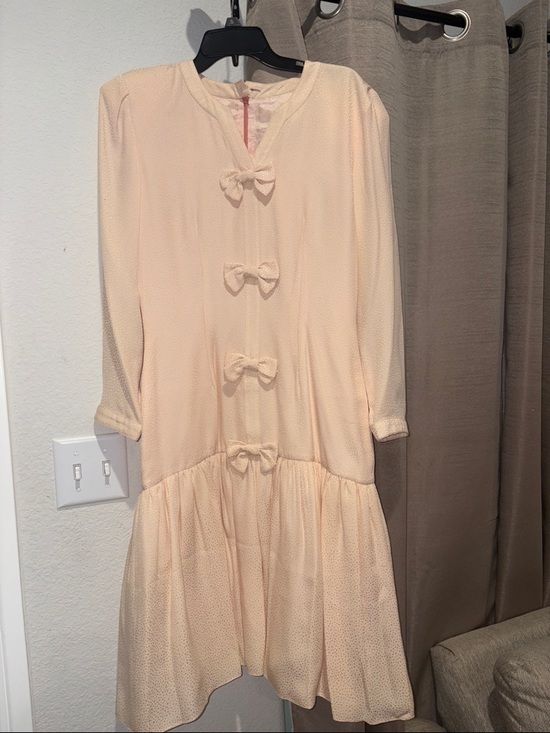 L Perez Dresses & Skirts - Women's Peach Midi Dress with Bow Details